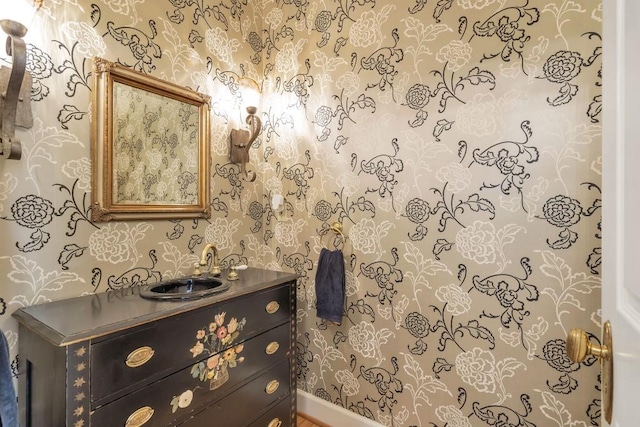 2190 Stephen Long Dr NE, Atlanta, GA 30305 - bathroom with wallpapered walls, vanity, and baseboards