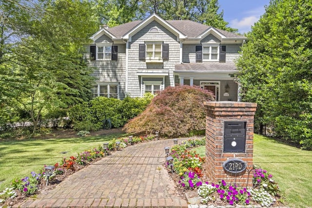 2190 Stephen Long Dr NE, Atlanta, GA 30305 - view of front of house featuring a front yard and a shingled roof