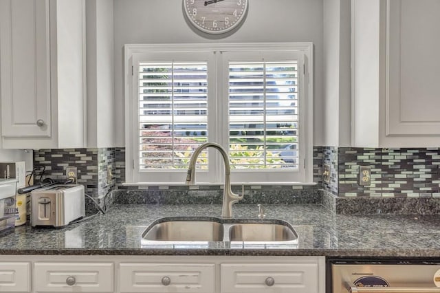 2190 Stephen Long Dr NE, Atlanta, GA 30305 - kitchen with a sink, stainless steel dishwasher, white cabinetry, and plenty of natural light