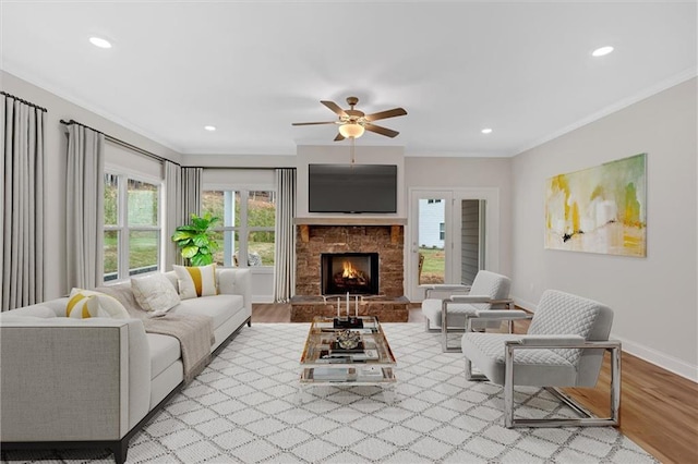 475 Azalea Xing, Dallas, GA 30132 - living room featuring crown molding, ceiling fan, wood finished floors, and baseboards