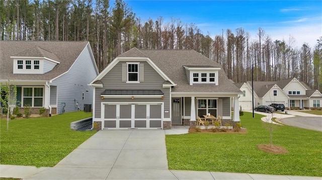 475 Azalea Xing, Dallas, GA 30132 - craftsman-style home with a standing seam roof, a front yard, a porch, and driveway