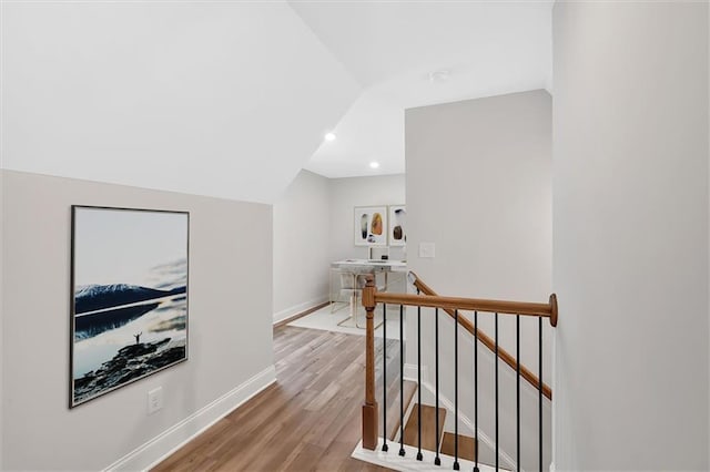 475 Azalea Xing, Dallas, GA 30132 - corridor with vaulted ceiling, recessed lighting, an upstairs landing, light wood finished floors, and baseboards