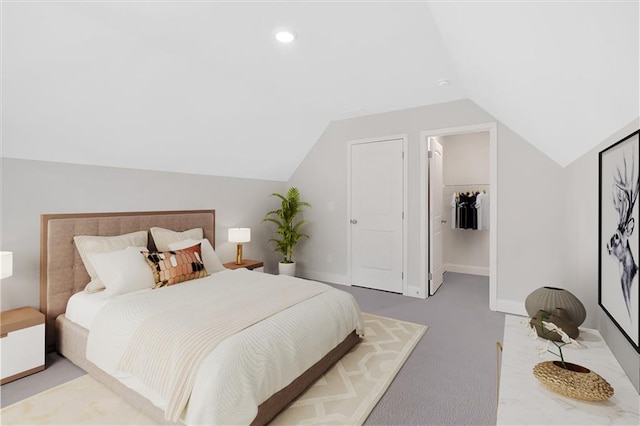 475 Azalea Xing, Dallas, GA 30132 - bedroom with recessed lighting, carpet flooring, a walk in closet, lofted ceiling, and baseboards