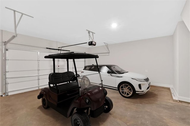 475 Azalea Xing, Dallas, GA 30132 - garage with baseboards and a garage door opener
