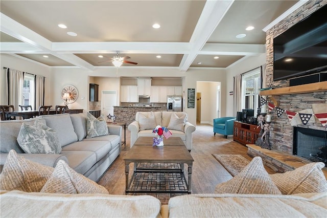 475 Azalea Xing, Dallas, GA 30132 - living area with ceiling fan, beamed ceiling, a fireplace, light wood-type flooring, and coffered ceiling