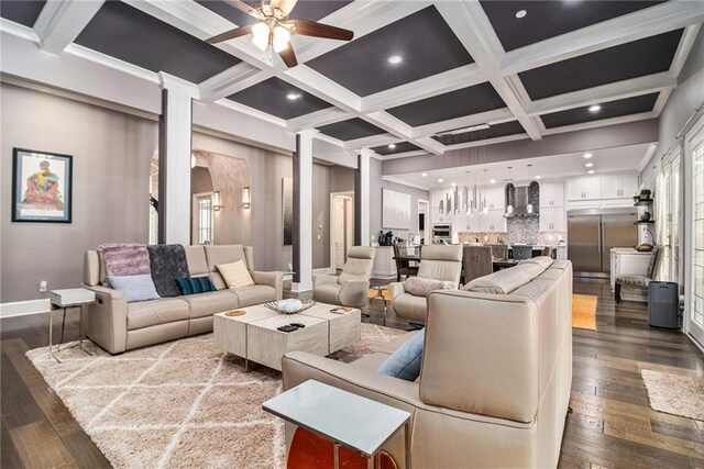 850 Cog Hl, Mcdonough, GA 30253 - living area featuring baseboards, ceiling fan, coffered ceiling, and dark wood finished floors