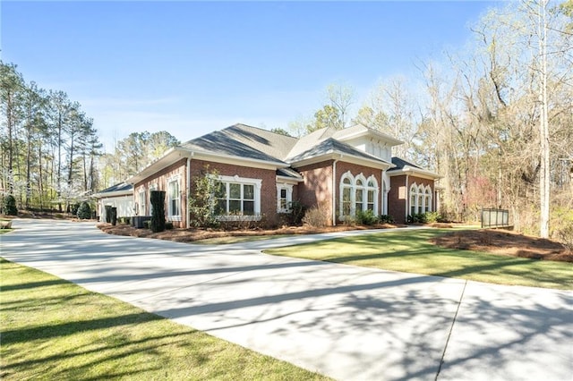 850 Cog Hl, Mcdonough, GA 30253 - craftsman house with brick siding, driveway, and a front yard