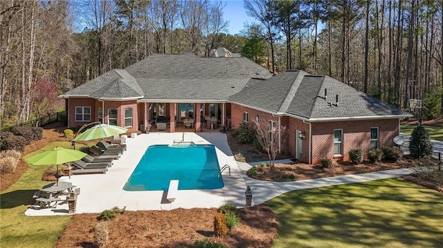 850 Cog Hl, Mcdonough, GA 30253 - back of house with fence, brick siding, an outdoor pool, a patio area, and a forest view