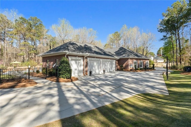 850 Cog Hl, Mcdonough, GA 30253 - view of home's exterior featuring fence, an attached garage, brick siding, concrete driveway, and a yard