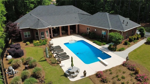 850 Cog Hl, Mcdonough, GA 30253 - outdoor pool featuring a lawn, a diving board, and a patio area