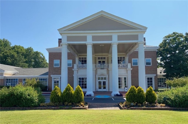 850 Cog Hl, Mcdonough, GA 30253 - greek revival house featuring french doors, a balcony, and a front lawn