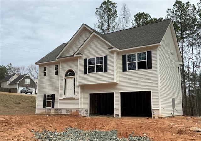 split foyer home featuring a garage