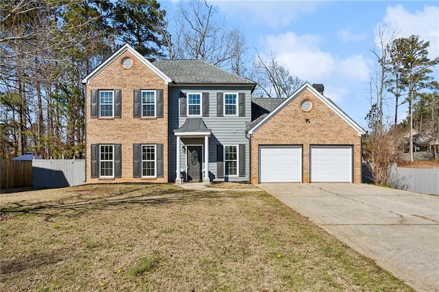 colonial-style house with a garage, driveway, brick siding, and fence