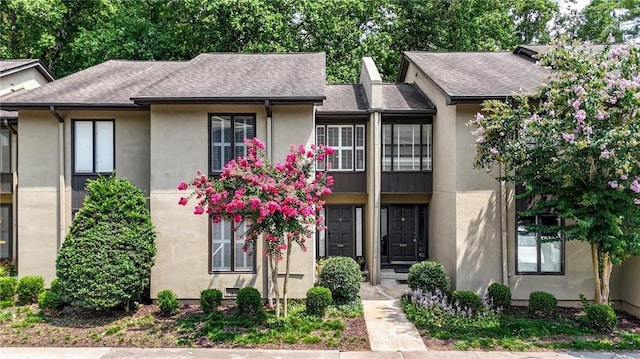 12 Ivy Rdg NE, Atlanta, GA 30342 - multi unit property featuring stucco siding, a shingled roof, and a balcony