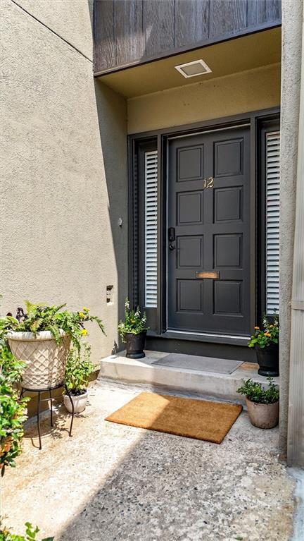 12 Ivy Rdg NE, Atlanta, GA 30342 - property entrance with stucco siding
