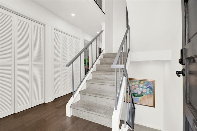 12 Ivy Rdg NE, Atlanta, GA 30342 - stairway with wood finished floors and recessed lighting