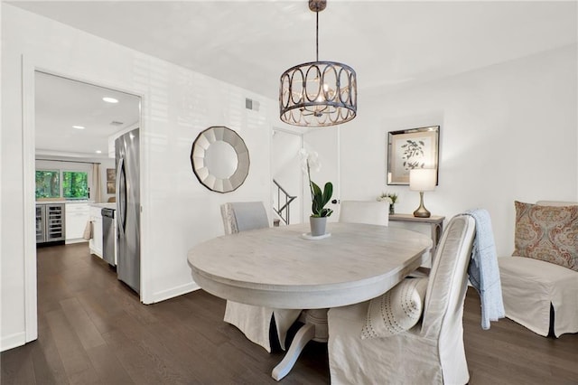 12 Ivy Rdg NE, Atlanta, GA 30342 - dining space featuring beverage cooler, dark wood-type flooring, a chandelier, and recessed lighting