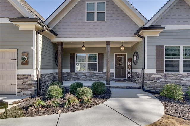 property entrance with covered porch