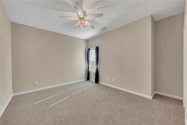 unfurnished room featuring carpet flooring and ceiling fan