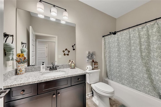 full bathroom with vanity, toilet, and shower / tub combo