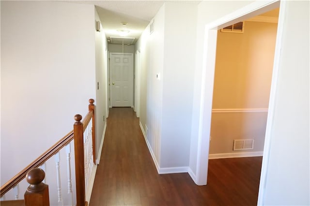 hall with dark hardwood / wood-style flooring