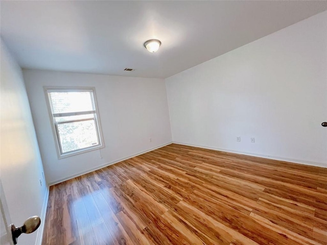 unfurnished room featuring light wood-type flooring