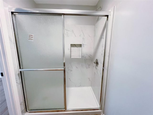 bathroom with walk in shower