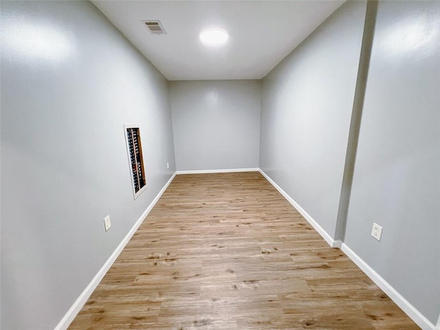 spare room featuring light hardwood / wood-style flooring