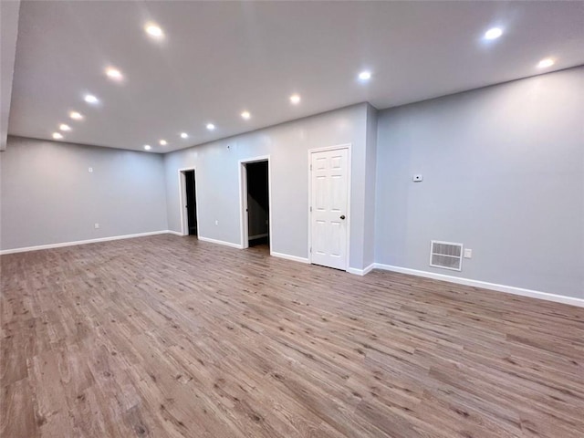 basement featuring hardwood / wood-style flooring