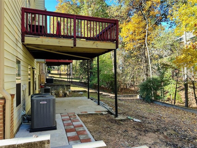 view of patio / terrace featuring central AC unit and a deck