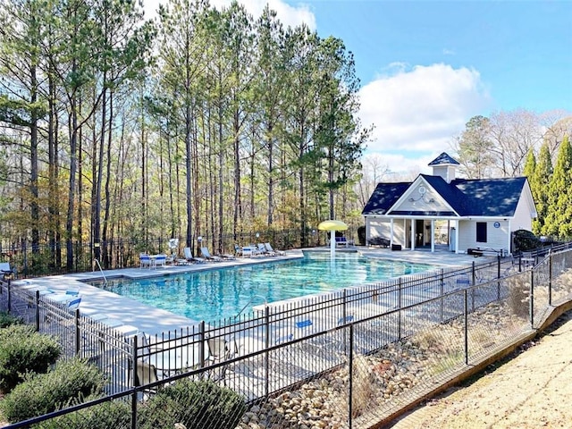 view of swimming pool featuring a patio