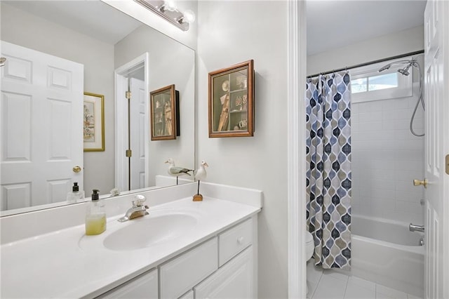 bathroom featuring vanity, tile patterned flooring, and shower / bath combo with shower curtain