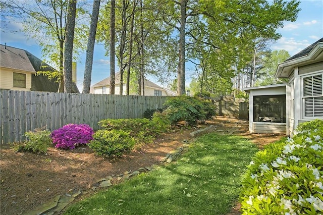 view of yard with a sunroom