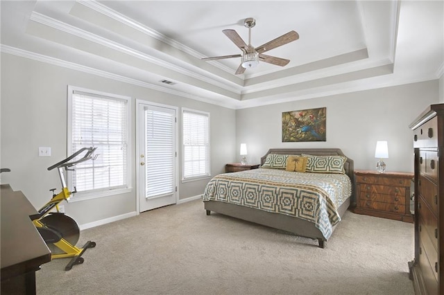 carpeted bedroom with access to outside, ornamental molding, a raised ceiling, and ceiling fan