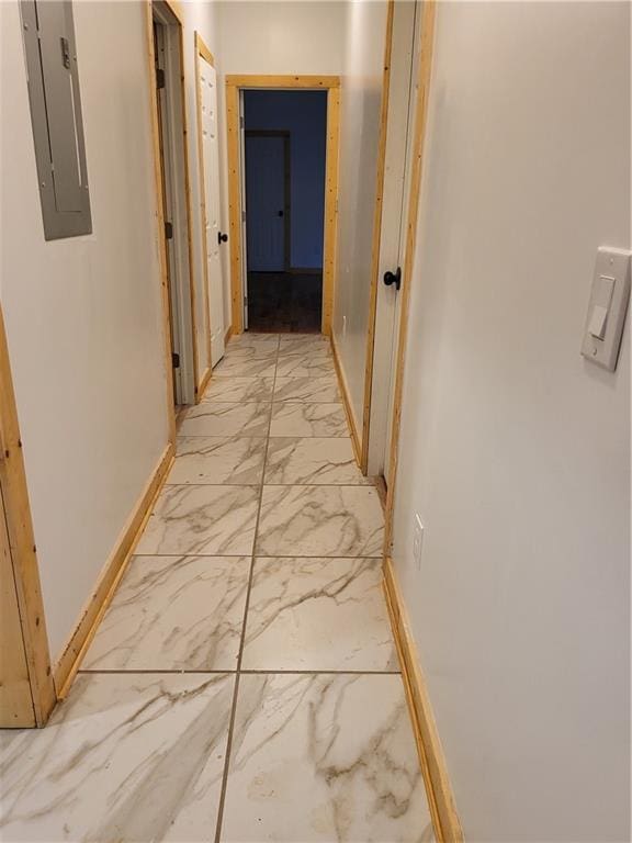 1167 Oakland Dr SW, Atlanta, GA 30310 - hallway with light marble finish floors, baseboards, and electric panel