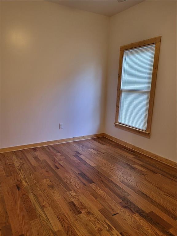 1167 Oakland Dr SW, Atlanta, GA 30310 - unfurnished room featuring wood finished floors