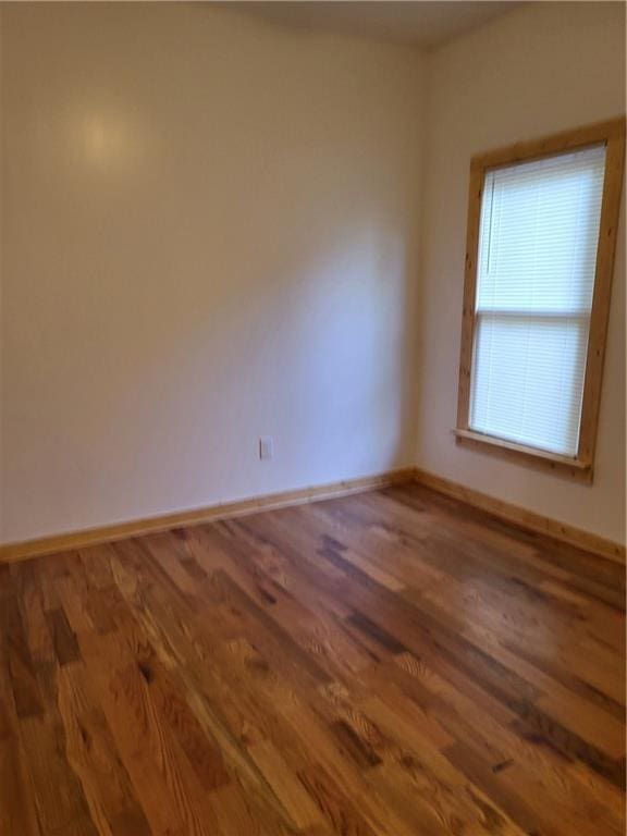 1167 Oakland Dr SW, Atlanta, GA 30310 - unfurnished room featuring wood finished floors and baseboards