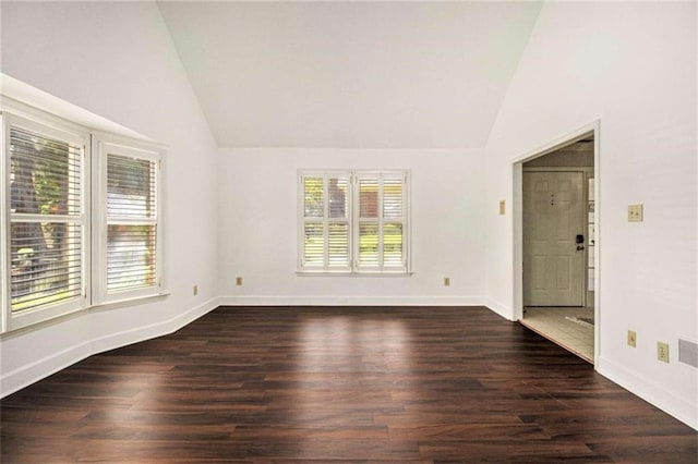 1484 Winston Pl, Decatur, GA 30033 - empty room featuring dark wood finished floors, lofted ceiling, and baseboards