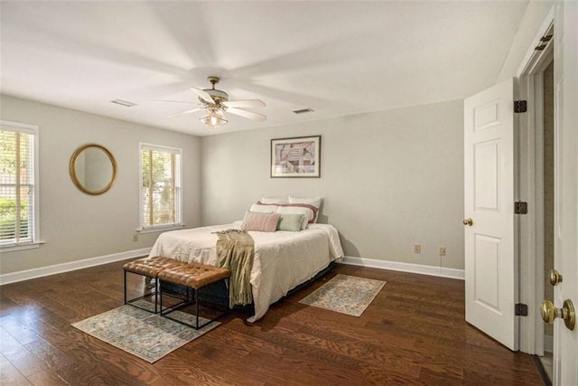 1484 Winston Pl, Decatur, GA 30033 - bedroom featuring ceiling fan, baseboards, wood finished floors, and multiple windows