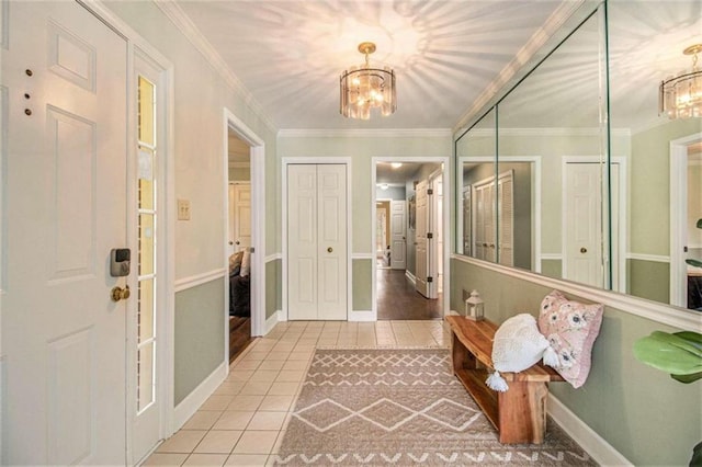 1484 Winston Pl, Decatur, GA 30033 - tiled entryway with baseboards, an inviting chandelier, and ornamental molding