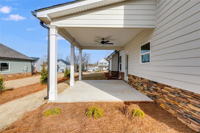 view of patio featuring ceiling fan