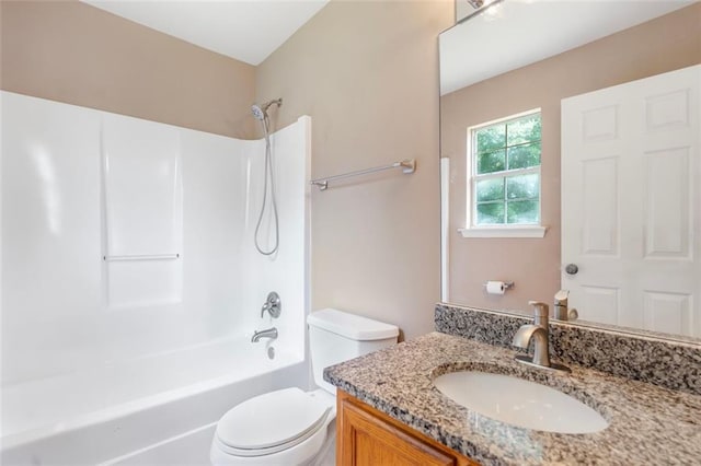 full bathroom with toilet, vanity, and shower / bathing tub combination