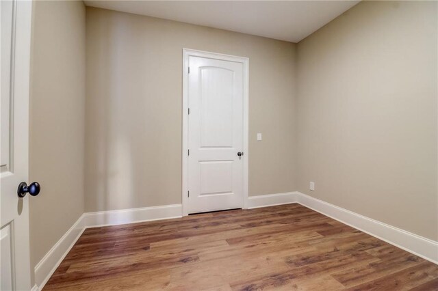 empty room featuring hardwood / wood-style floors