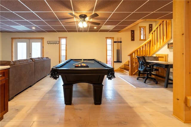 recreation room with ceiling fan, billiards, light hardwood / wood-style floors, and a drop ceiling