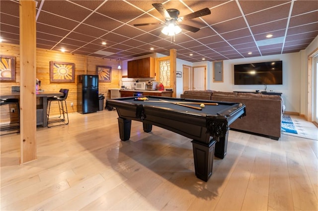 playroom with a drop ceiling, billiards, and wood walls