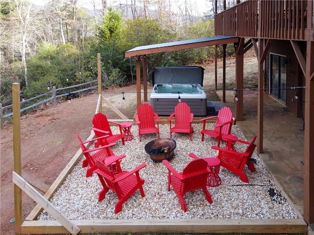 view of patio / terrace featuring a hot tub