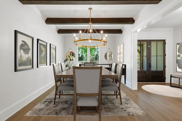 dining room featuring french doors, hardwood / wood-style floors, beam ceiling, and a notable chandelier