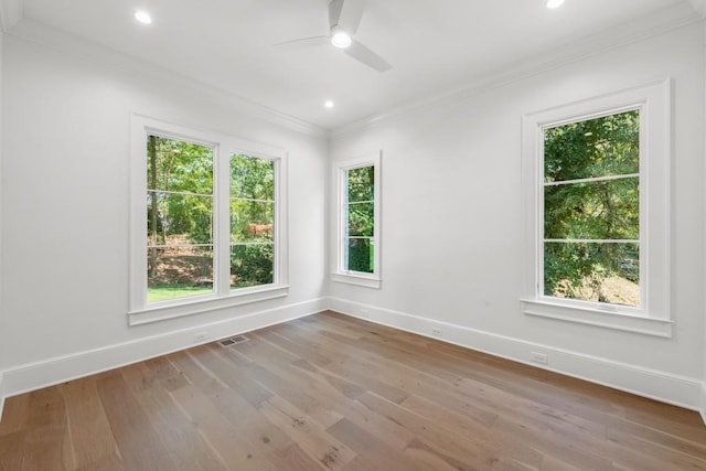 unfurnished room featuring crown molding, ceiling fan, and hardwood / wood-style floors