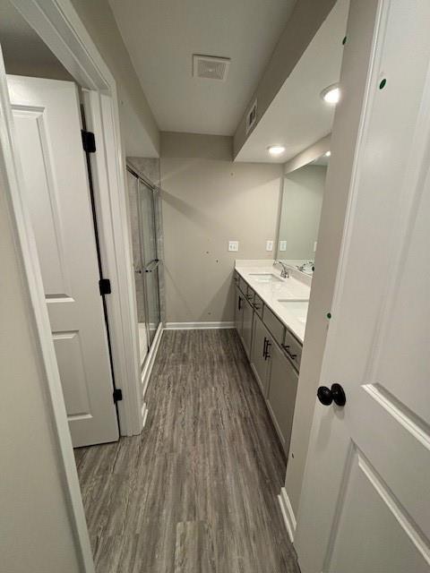 carpeted bedroom featuring ceiling fan, ornamental molding, and a raised ceiling