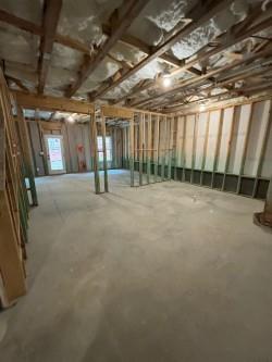 spare room featuring dark wood-type flooring